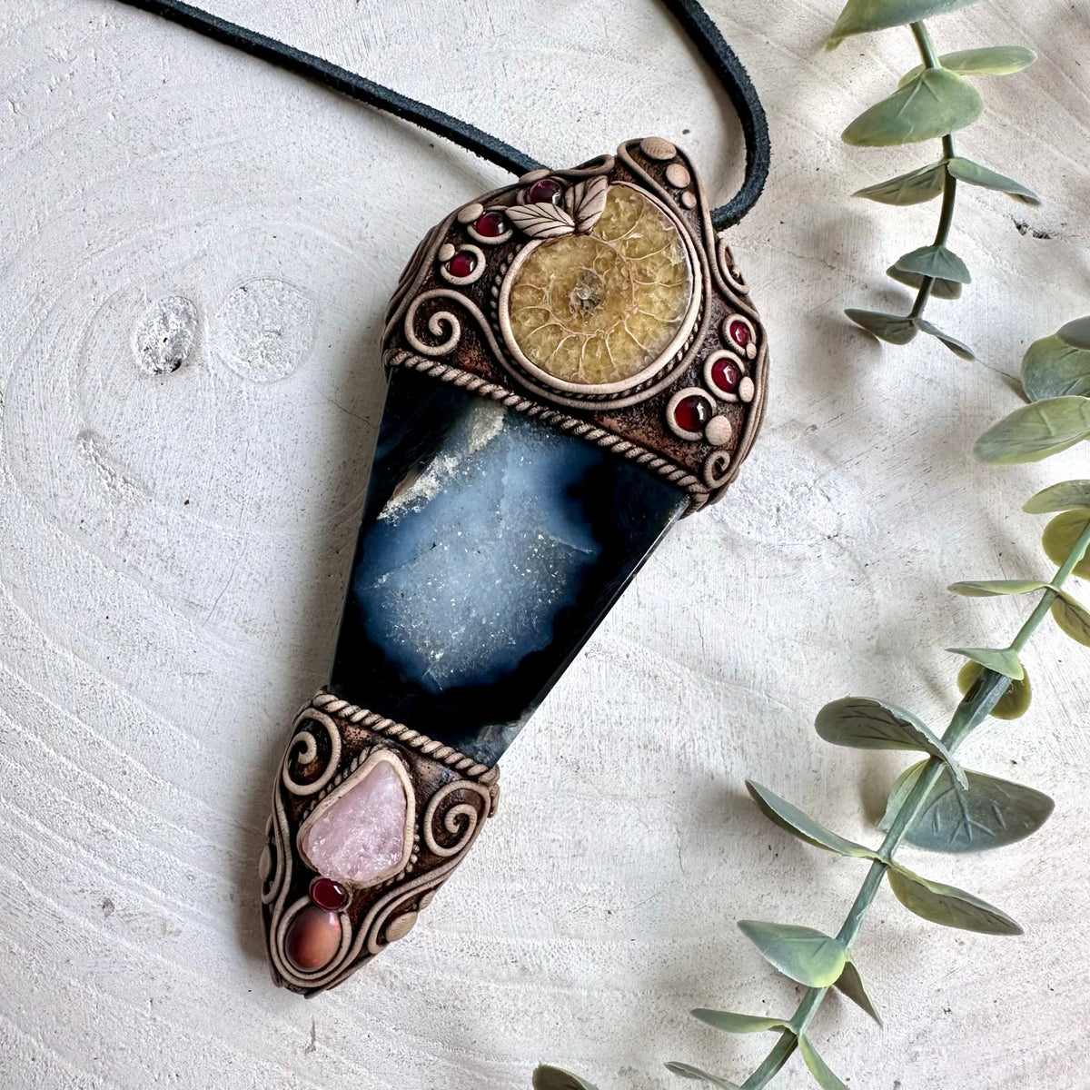 Agate with Ammonite, Raw Morganite, Ethiopian Opal and Rhodolite Garnet crystal wand pendant necklace, handmade as unique spiritual gemstone jewelry. A meaningful handmade crystal wand necklace for meditation, intention setting, energy work or everyday mystical wear, created for those drawn to unusual natural stones, fossil treasures and one of a kind spiritual jewelry.