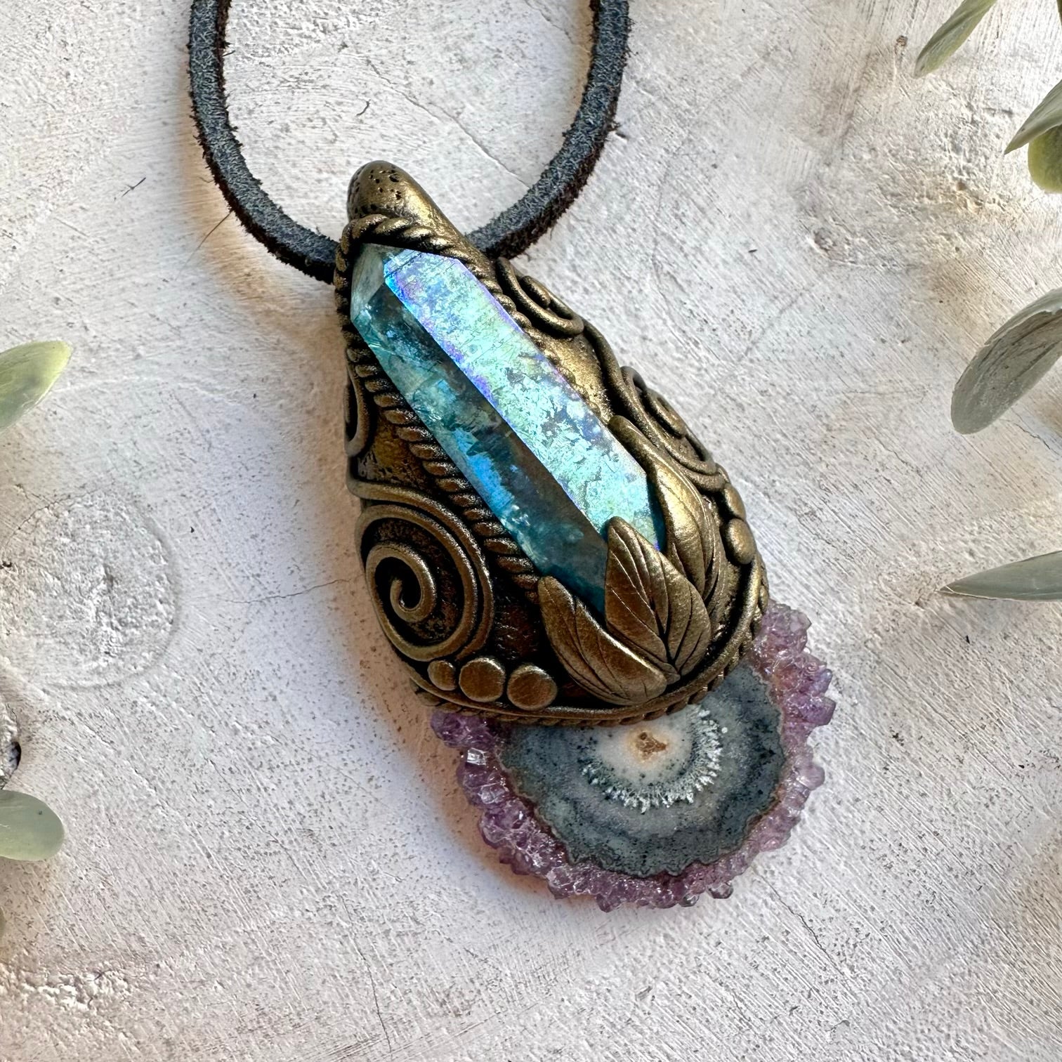 Handmade pendant necklace featuring an Amethyst Stalactite and Aqua Aura Quartz.