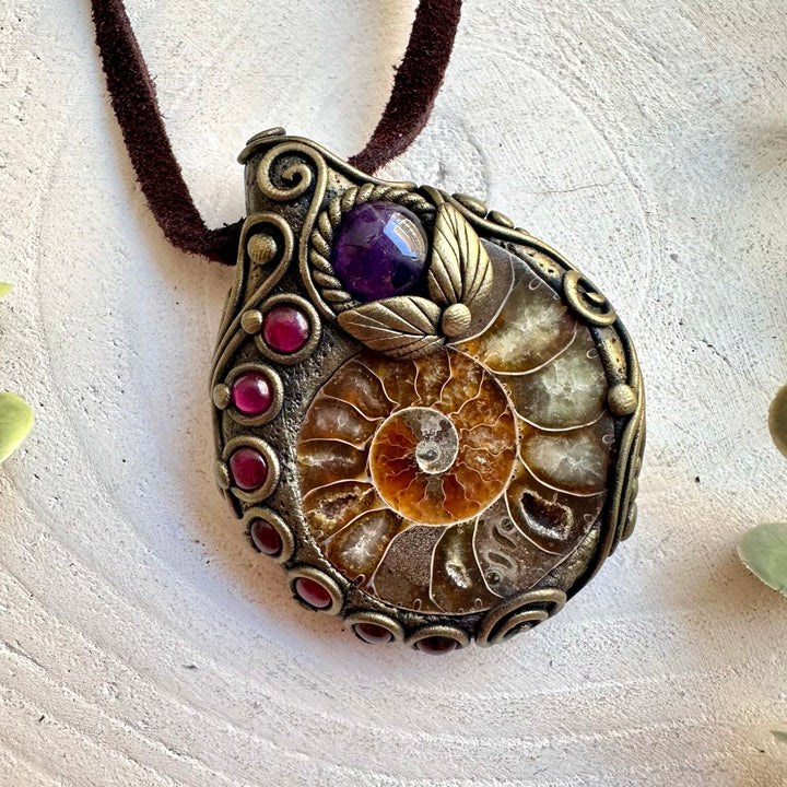 Unique healing crystal necklace with natural Ammonite, Amethyst and Rhodolite Garnet.