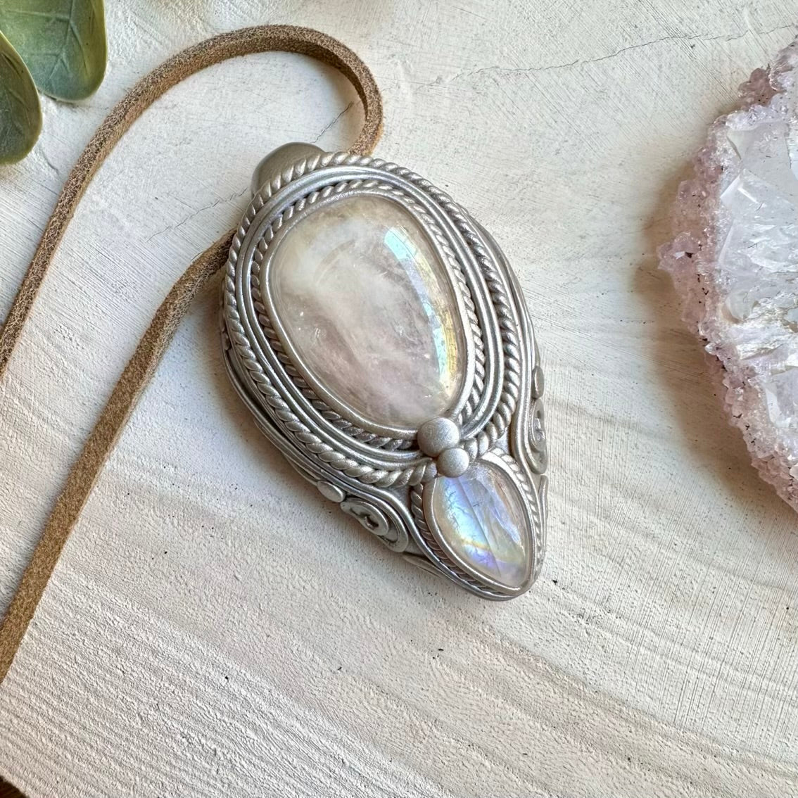 Spiritual pendant featuring angel aura rose quartz