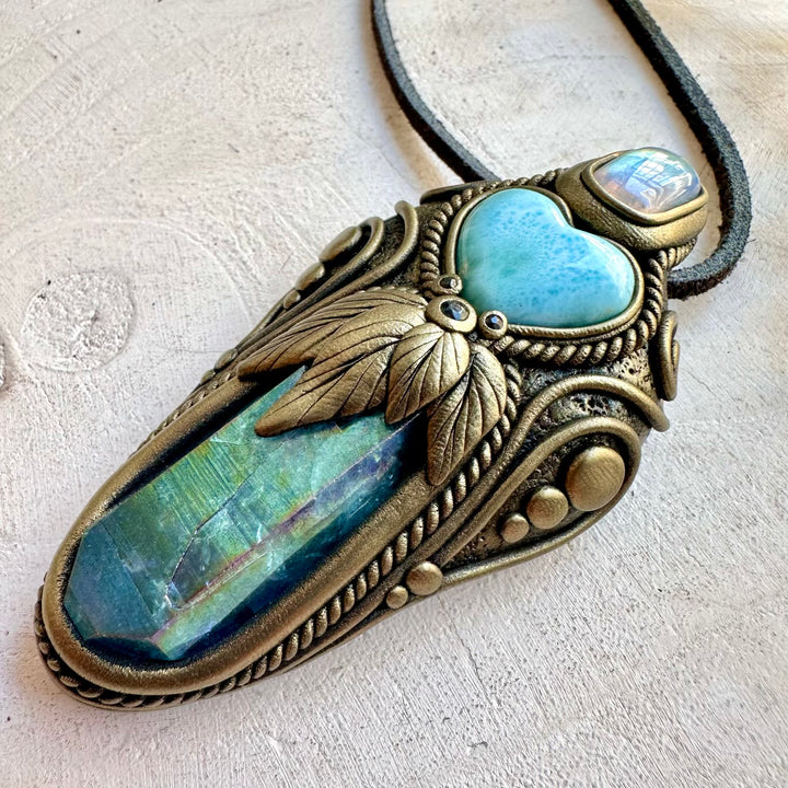 Handmade energy wand crafted with Aqua Aura Quartz, Rainbow Moonstone and Blue Sapphire.