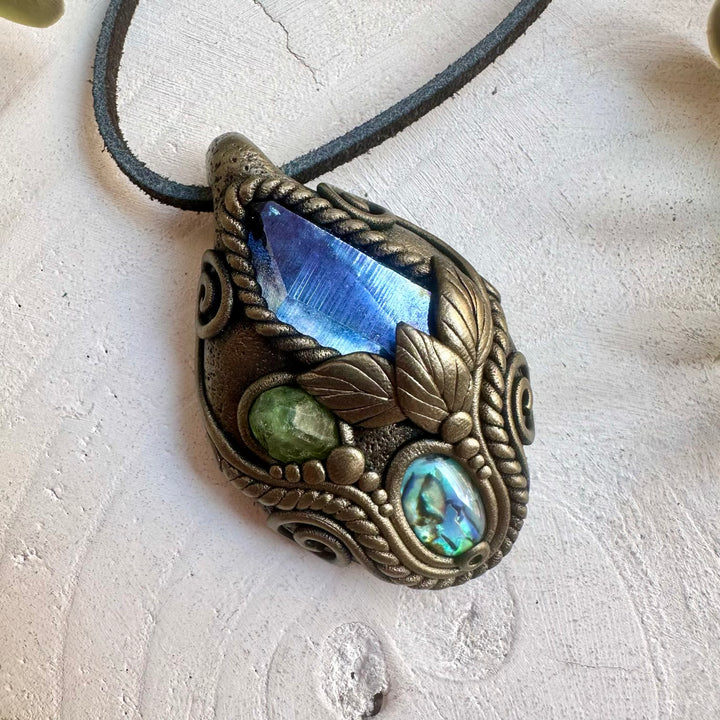 Spiritual gemstone necklace designed with Aqua Aura Quartz, Abalone and Peridot in a handmade setting.