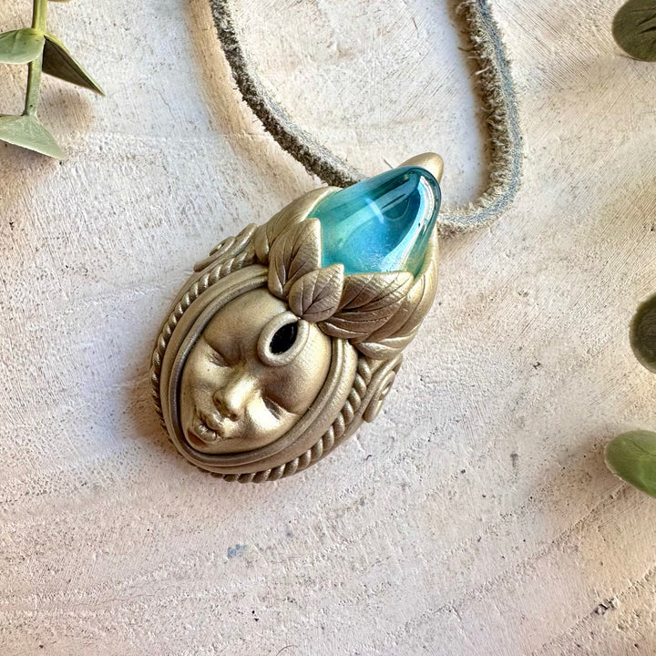 Aqua Aura Quartz and Blue Sapphire Goddess necklace, handcrafted as unique spiritual gemstone jewelry.