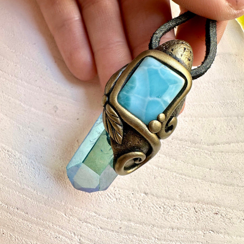 Healing stone necklace combining Aqua Aura Quartz and Larimar