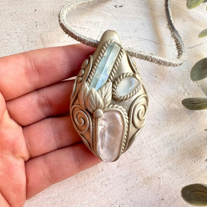 One of a kind gemstone necklace with soft blue Aquamarine, luminous Danburite and Clear Topaz.