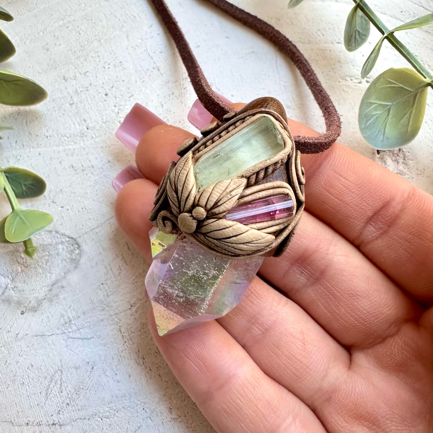 Spiritual jewelry combining aura quartz aquamarine and tourmaline