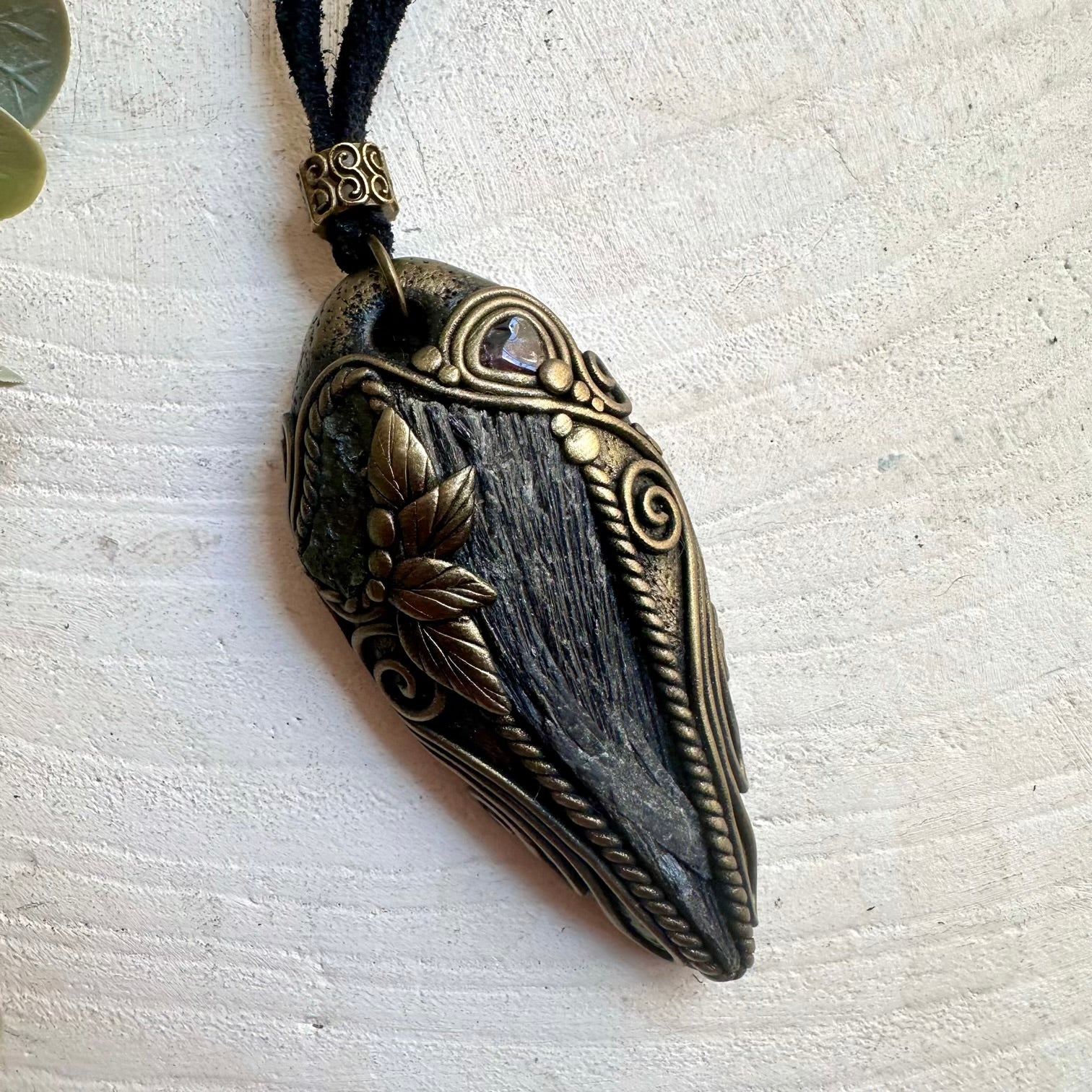 Unisex gemstone pendant handcrafted with Black Kyanite, Moldavite and vibrant Red Garnet.