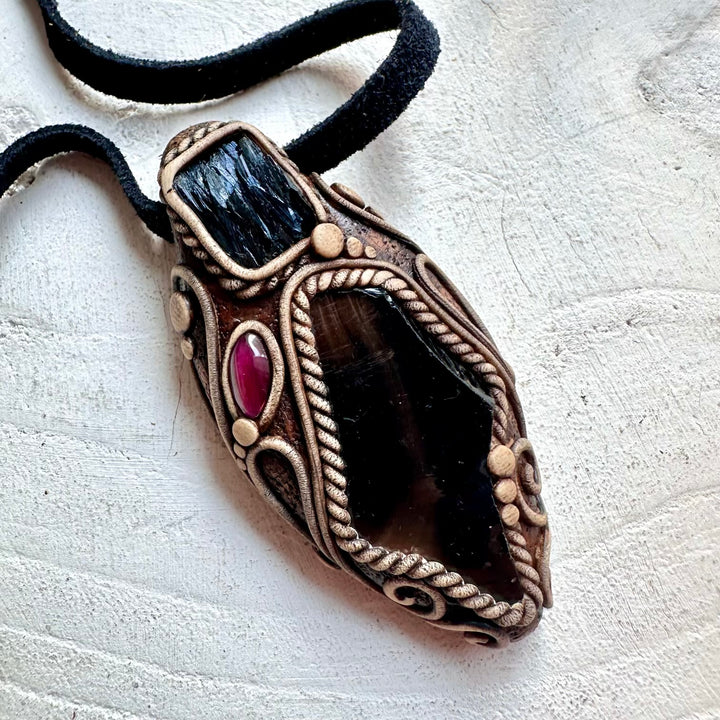 Spiritual gemstone jewelry featuring Black Obsidian, Vivianite and Garnet for a unique statement look.