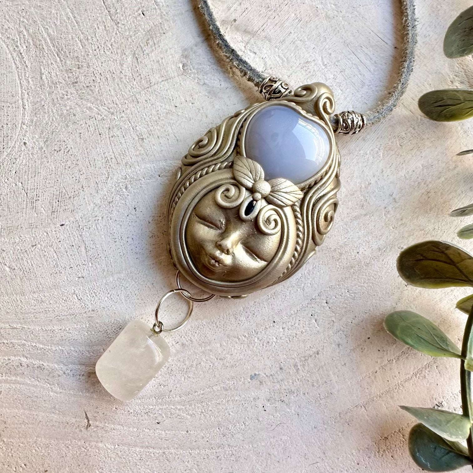 Natural gemstone jewelry handcrafted with Blue Chalcedony, Clear Quartz and Blue Sapphire.