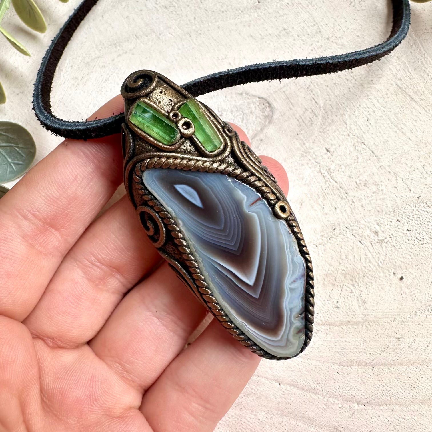 Spiritual gemstone necklace featuring Botswana Agate and Green Tourmaline for protection, healing, and positive energy.