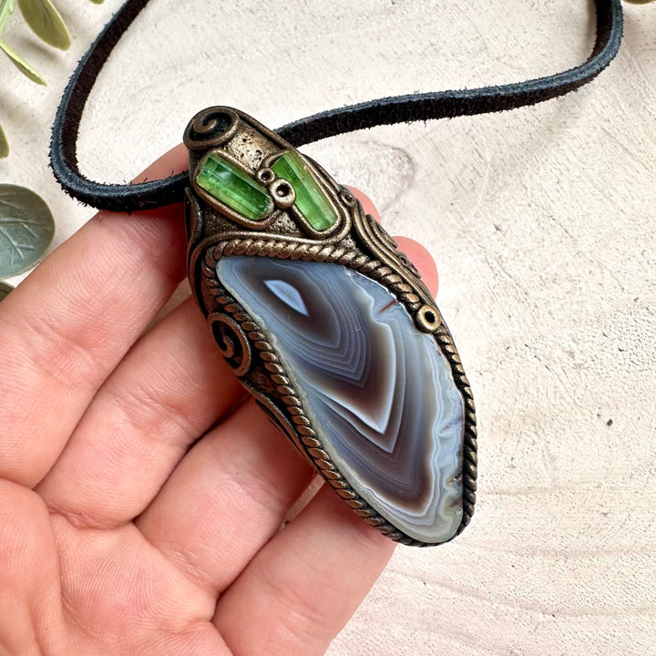 Spiritual gemstone necklace featuring Botswana Agate and Green Tourmaline for protection, healing, and positive energy.