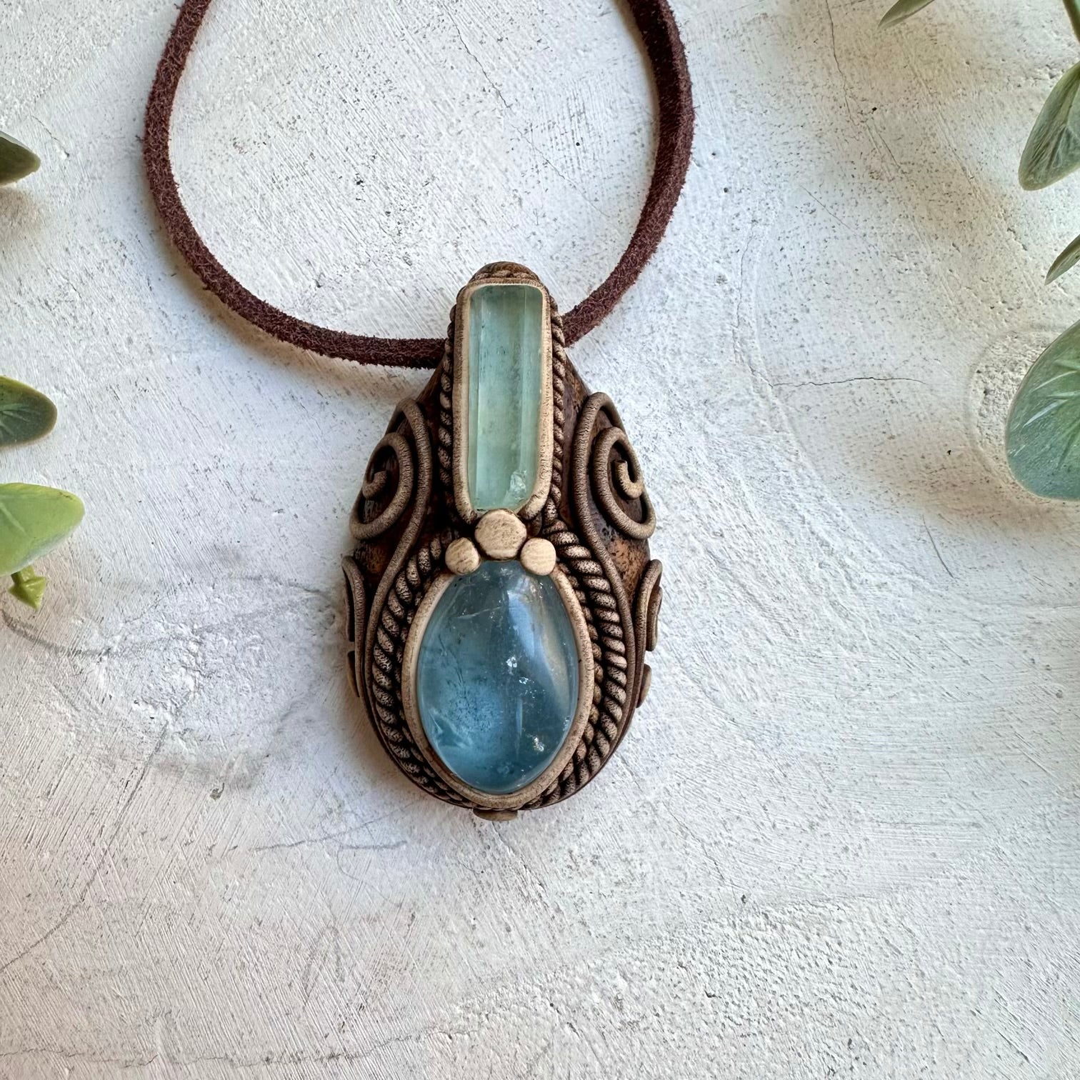 Celestite paired with aquamarine in a necklace