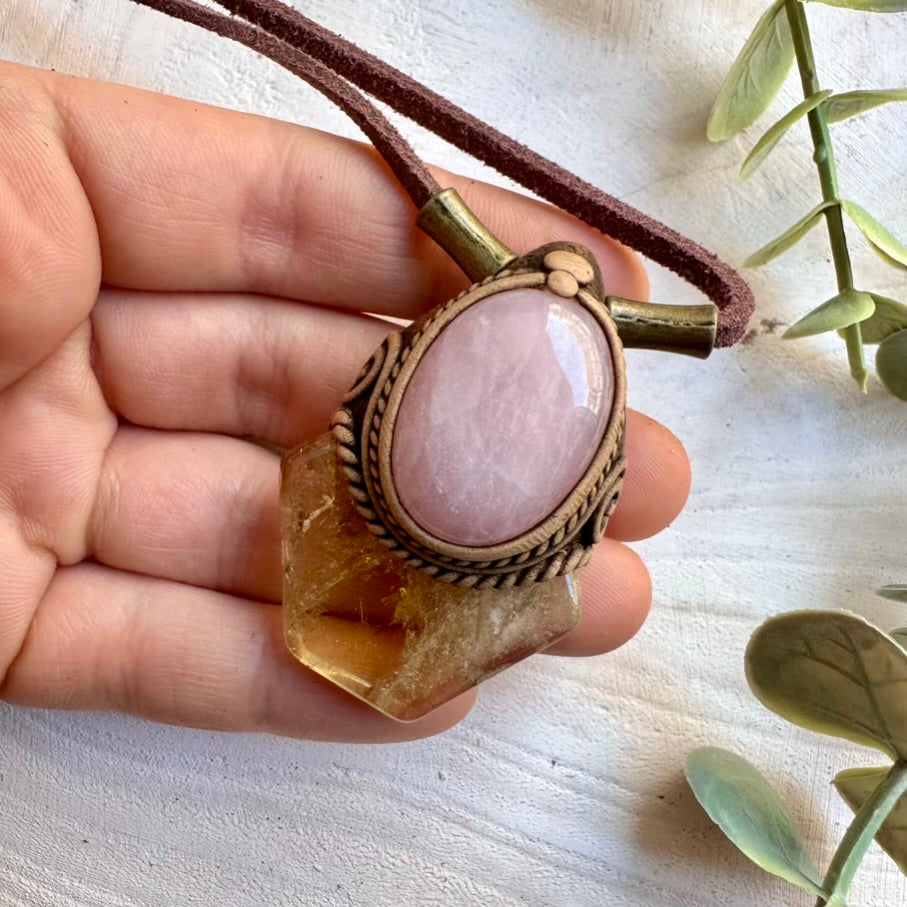 Spiritual crystal necklace featuring citrine and rose quartz stones