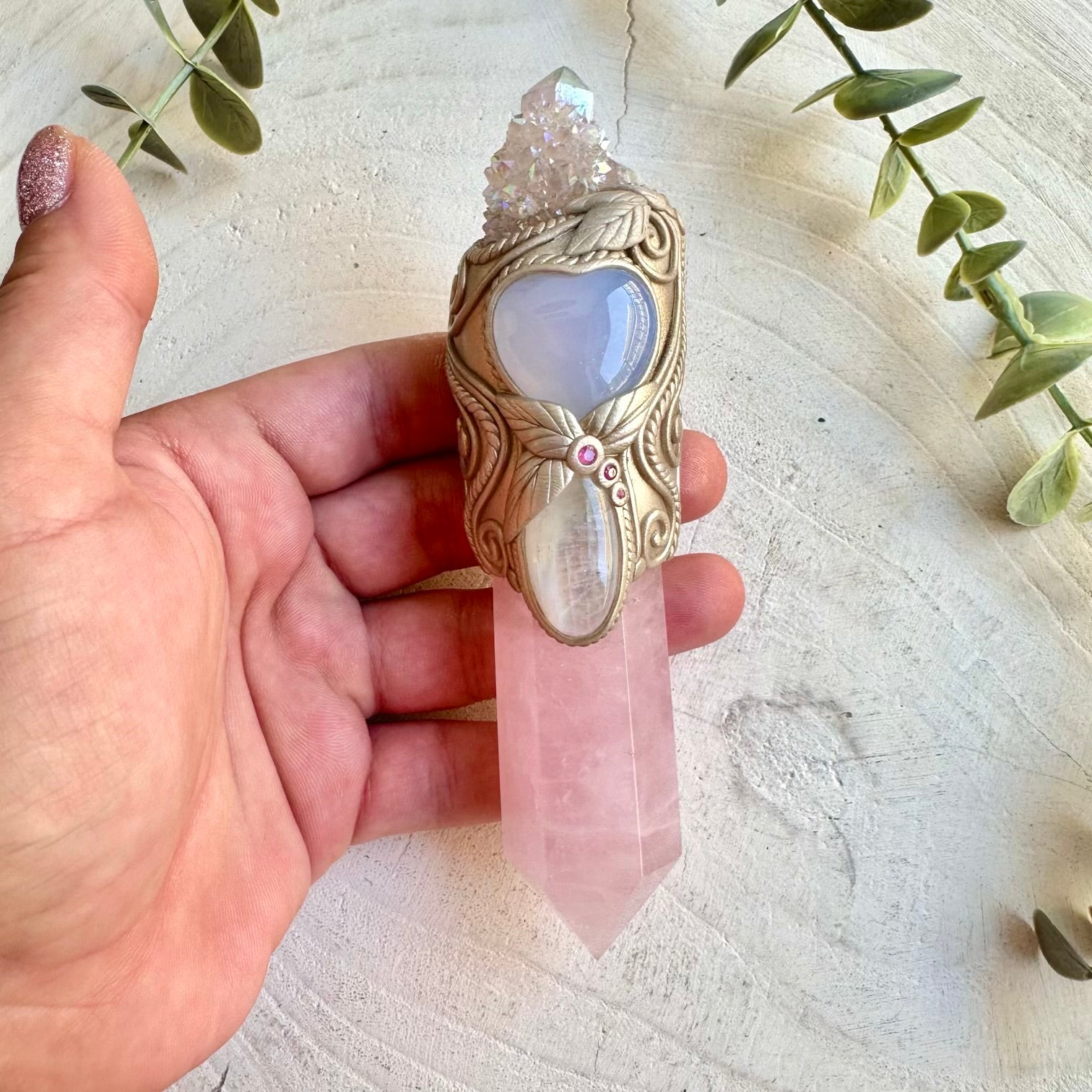 Healing gemstone wand with angel aura quartz for spiritual connection and harmony