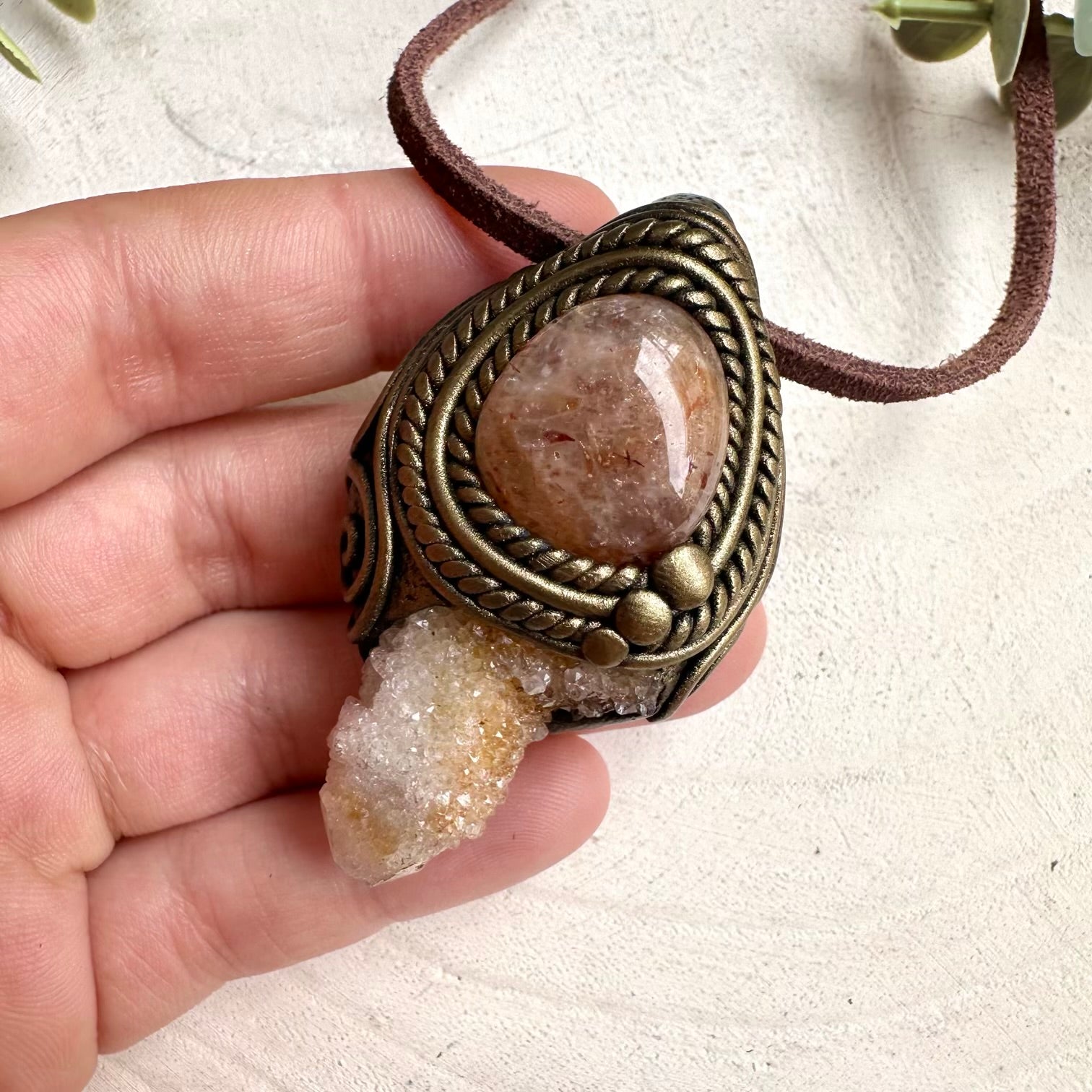 Crystal pendant necklace with Spirit Quartz and Hematite Quartz designed for meditation and metaphysical practices.