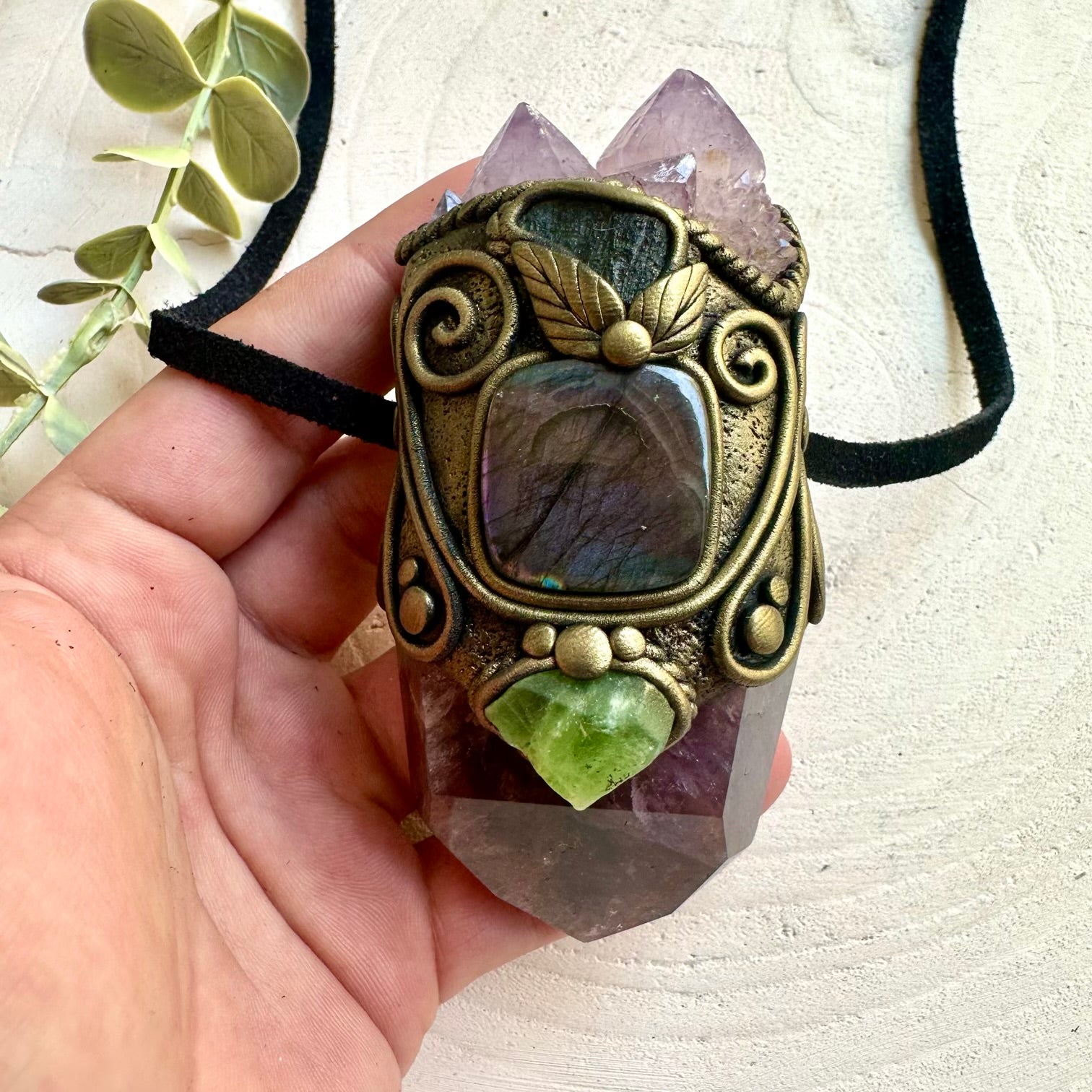 Statement crystal wand pendant combining Super Seven Quartz with rare natural gemstones.