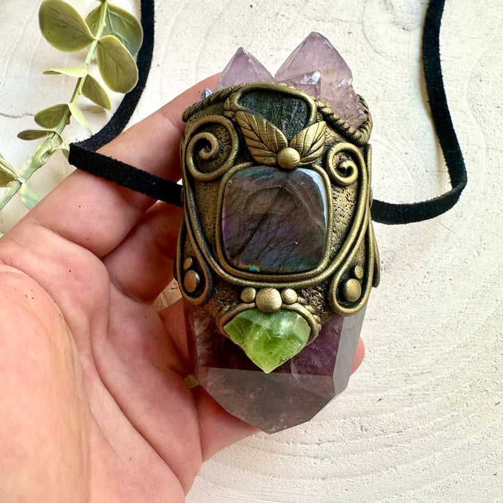 Statement crystal wand pendant combining Super Seven Quartz with rare natural gemstones.