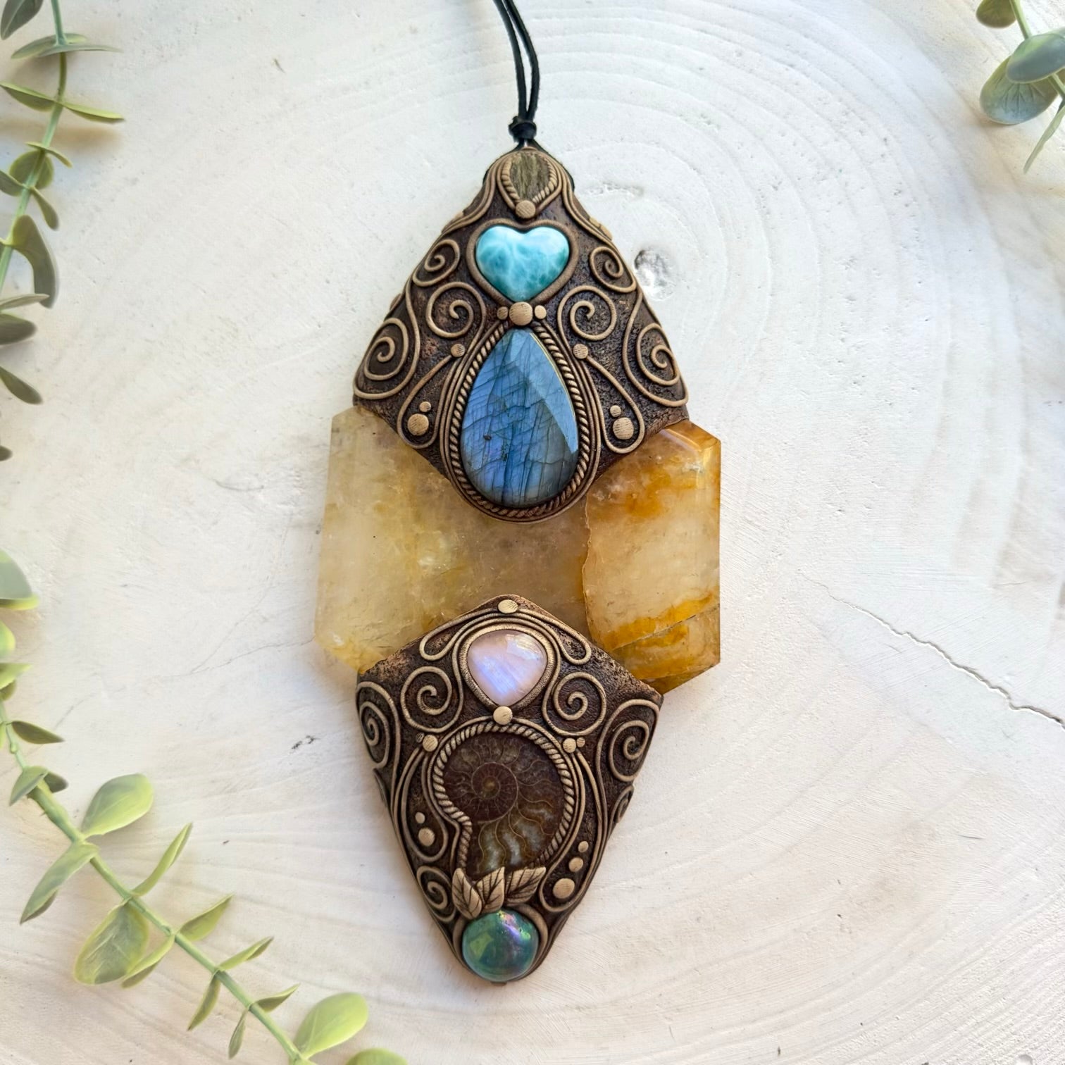 Spiritual home decor featuring Larimar heart, Aqua Aura Quartz and Moonstone