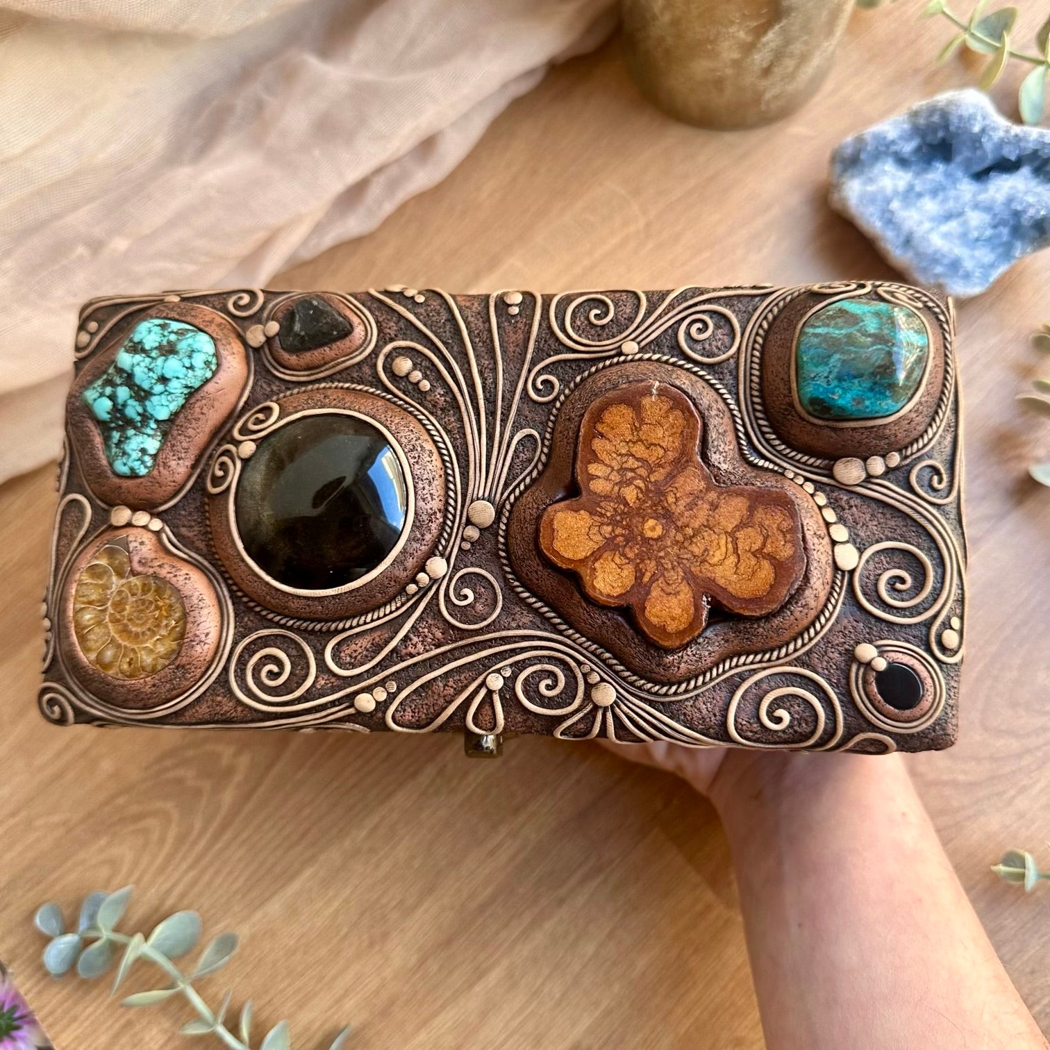 Handmade wooden box decorated with crystals for spiritual home decor