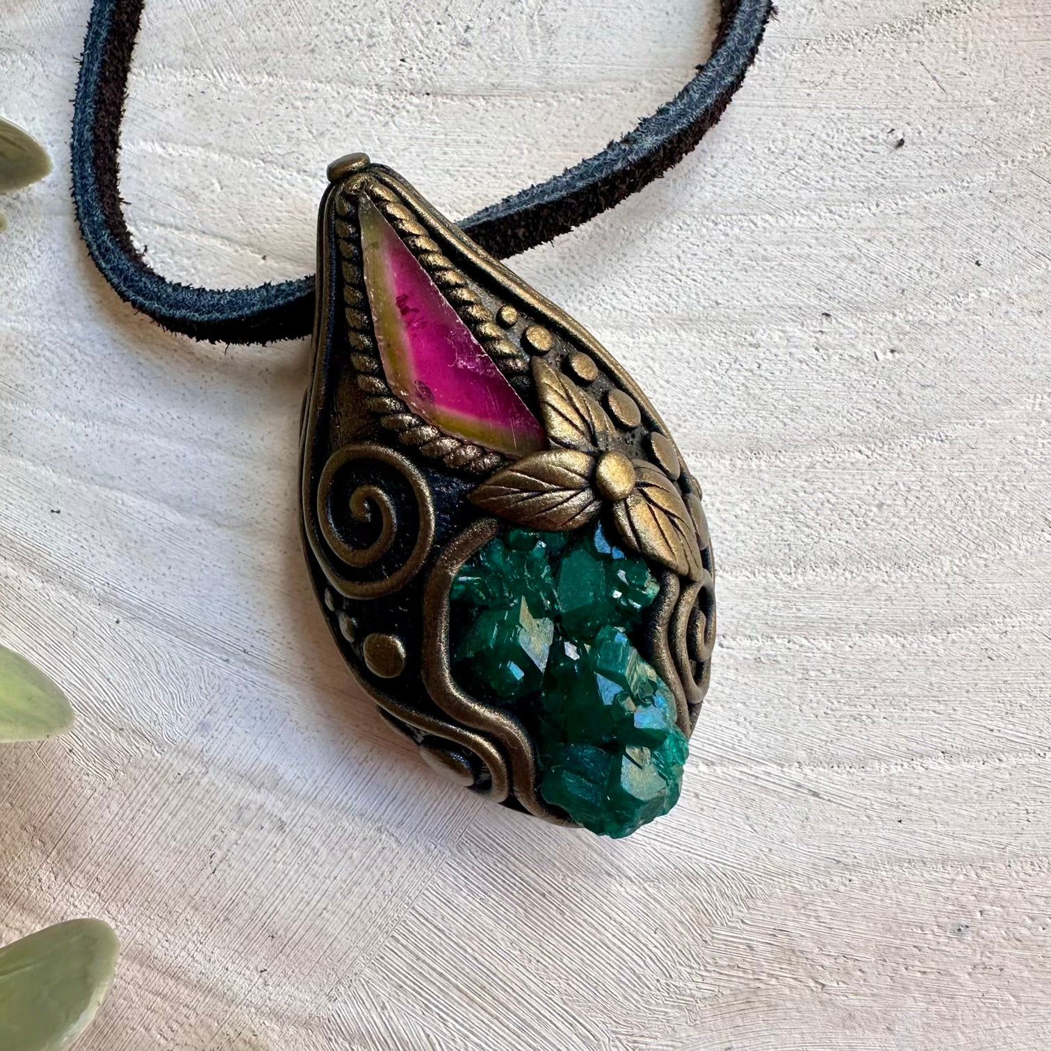 Dioptase paired with watermelon tourmaline in a necklace