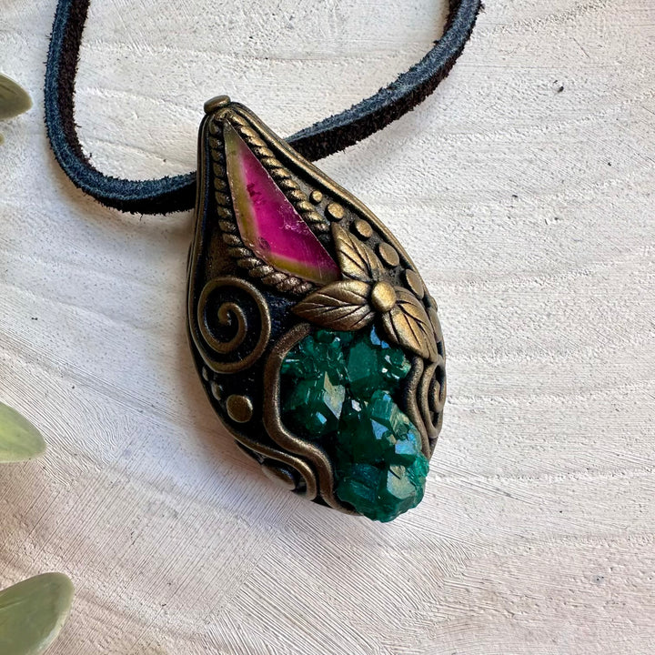 Dioptase paired with watermelon tourmaline in a necklace