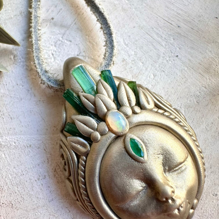 Handmade Green Tourmaline Goddess necklace featuring Ethiopian Opal and Emerald, a one of a kind spiritual gemstone jewelry piece combining lush green gemstones with mesmerizing Opal flashes. An enchanting healing crystal talisman for growth, love, creativity, emotional balance, abundance and personal transformation.