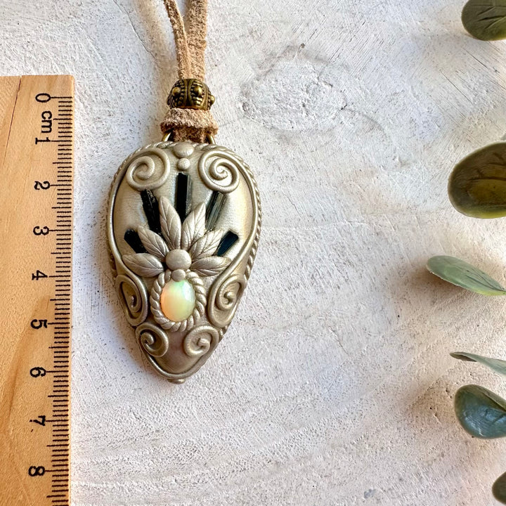 One of a kind gemstone necklace with blue Tourmaline and colorful Ethiopian Opal.