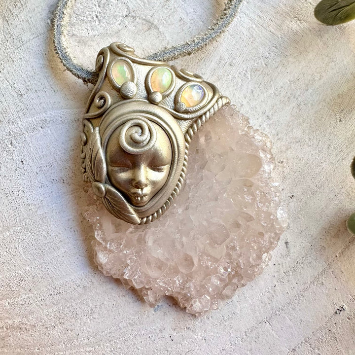 One of a kind handmade jewelry combining natural Quartz formations with vibrant Ethiopian Opal.