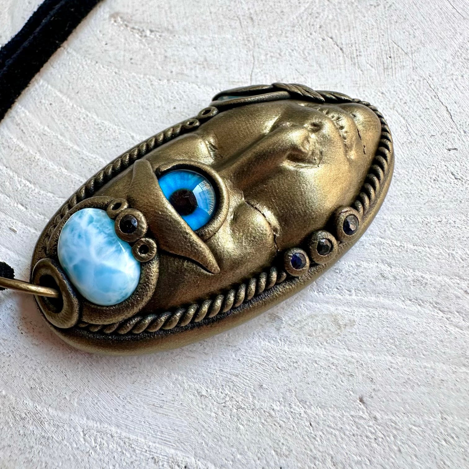 Handmade spiritual jewelry with Larimar, Ethiopian Opal and Blue Sapphire in a Goddess-inspired design.