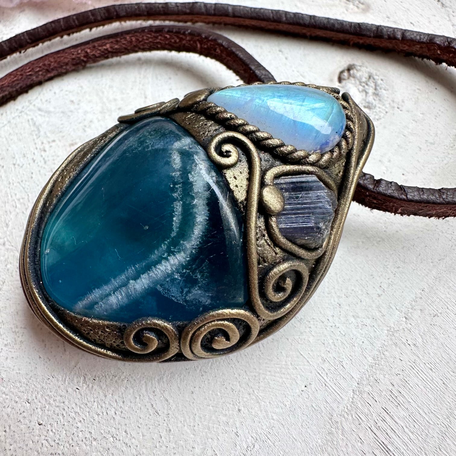 Blue fluorite paired with rainbow moonstone and tanzanite