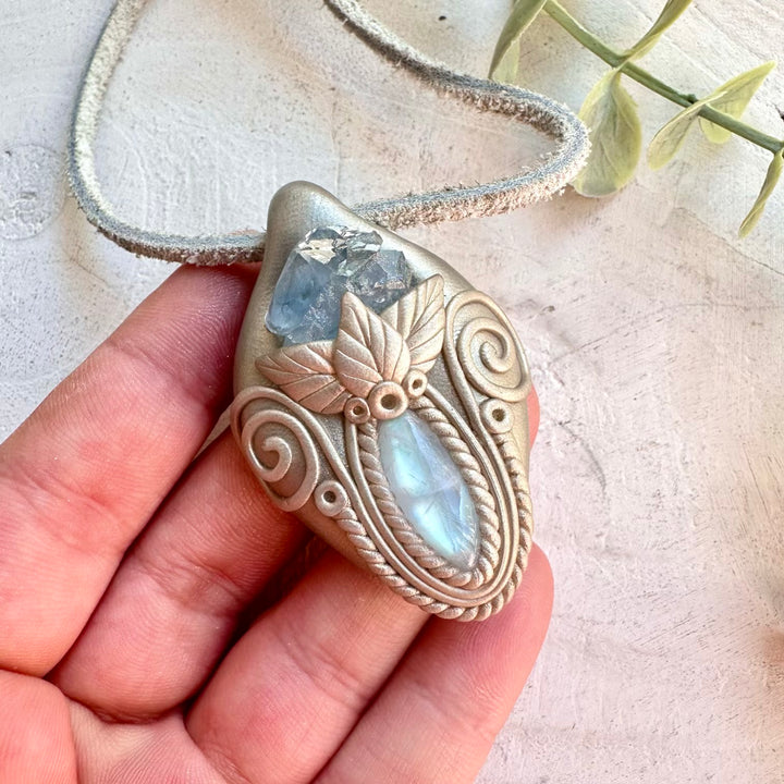 Metaphysical handmade crystal jewelry with rainbow moonstone and raw celestite