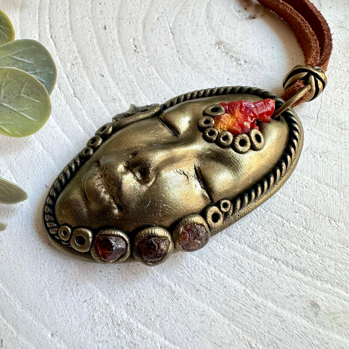 Handmade crystal jewelry with Vanadinite, Moldavite and Hessonite Garnet in a Goddess-inspired design.