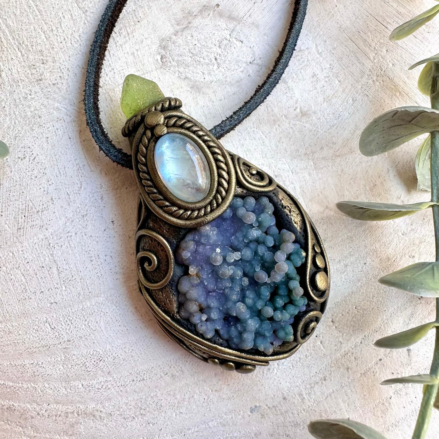 Handmade healing crystal necklace featuring Grape Chalcedony, Rainbow Moonstone and Peridot.