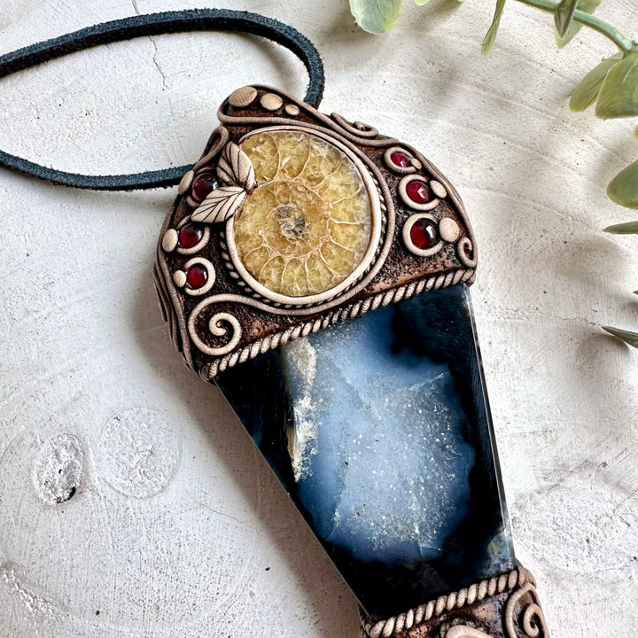 Handmade healing crystal jewelry combining Agate, Ammonite, Morganite, Ethiopian Opal and Rhodolite Garnet for meditation and intention setting.
