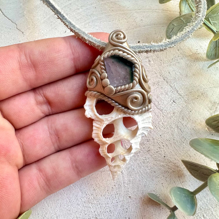 Spiritual necklace featuring bi-color tourmaline and seashell