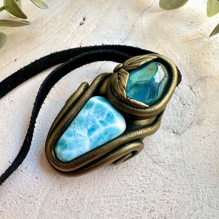 Natural clay gemstone jewelry featuring Larimar and Aqua Aura Quartz.