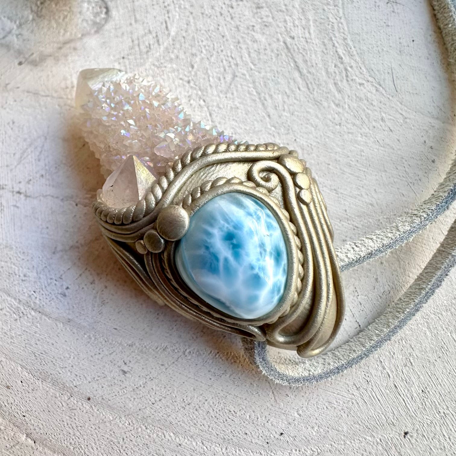Spiritual jewelry combining aura quartz and larimar