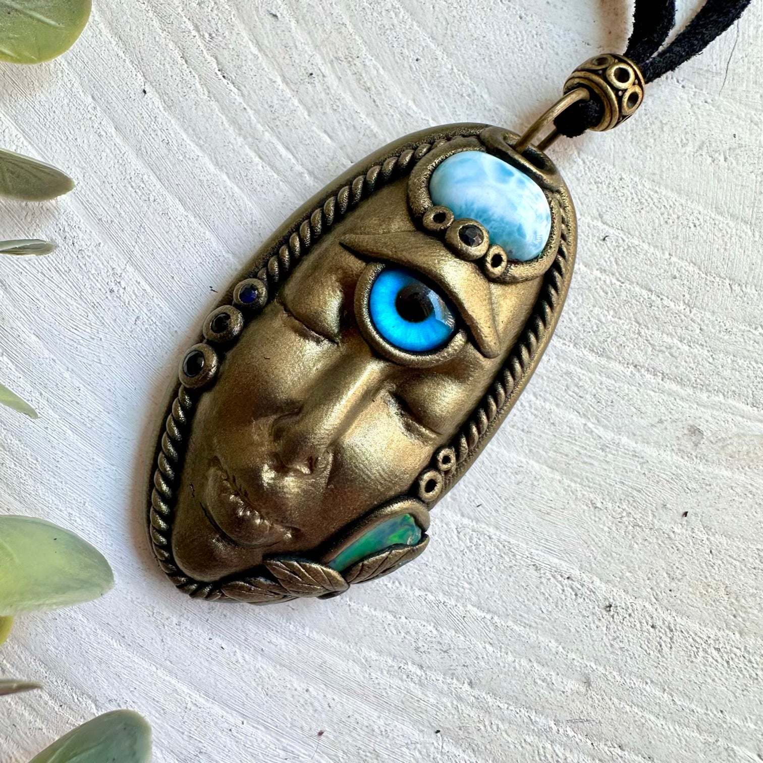 Handmade gemstone necklace combining natural Larimar with Raw Ethiopian Opal and Sapphire accents.