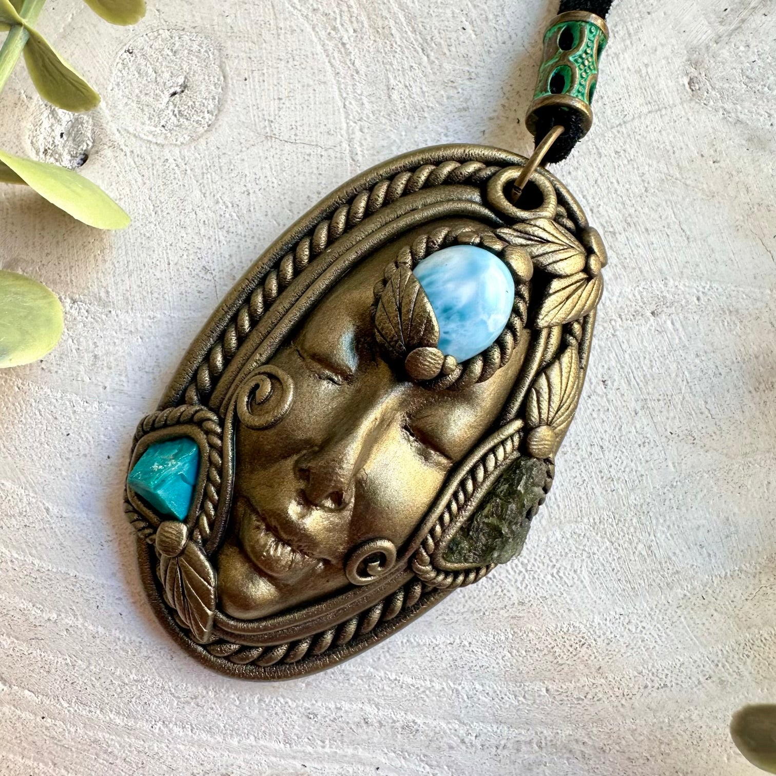 Unique Goddess necklace featuring soft blue Larimar and a raw Chrysocolla gemstone.