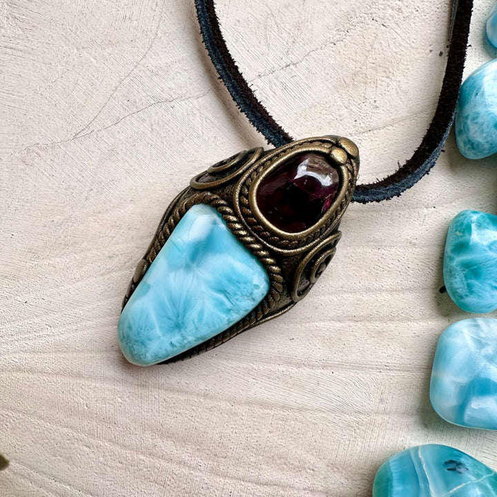 Energy pendant with larimar and rhodolite garnet
