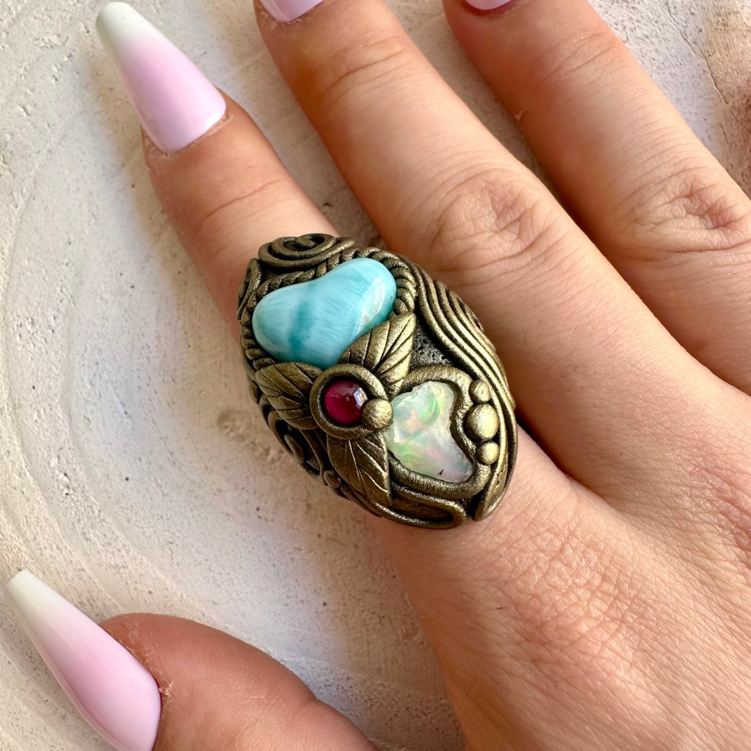 Larimar Heart with Raw Ethiopian Opal and Rhodolite Garnet ring, handcrafted as unique gemstone jewelry.