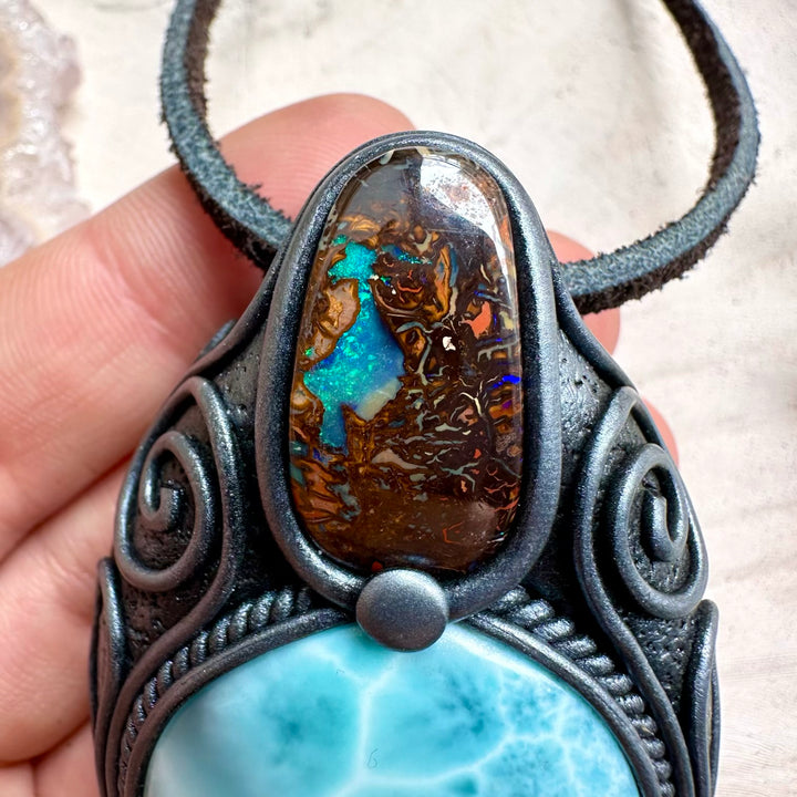 Spiritual jewelry combining larimar and boulder opal