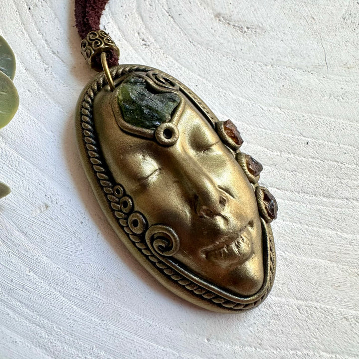 Statement gemstone jewelry combining green Moldavite with rich Hessonite Garnet.