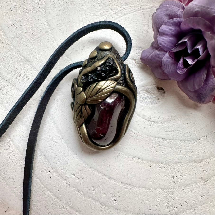 Ethically sourced Red Garnet and rare green Moldavite pendant necklace, artisan handcrafted metaphysical jewelry.