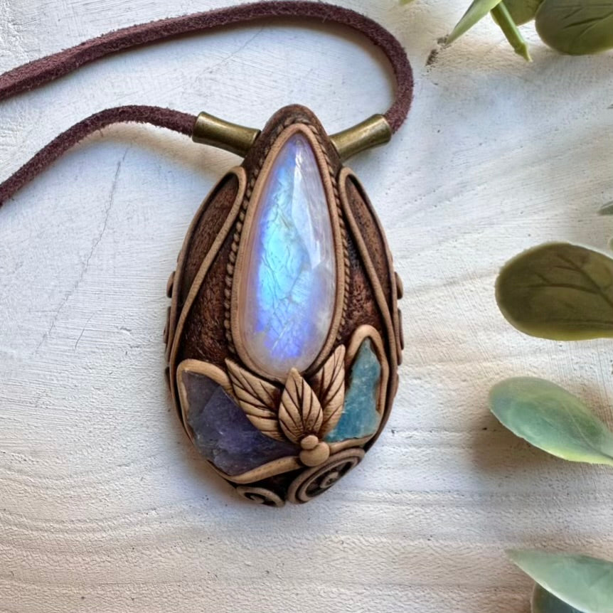 Metaphysical jewelry necklace with rainbow moonstone and aquamarine