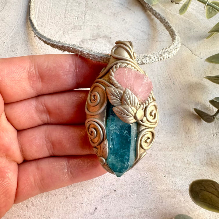 Handmade crystal jewelry combining iridescent Aqua Aura Quartz with natural Morganite.