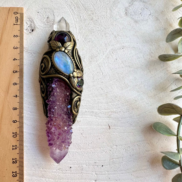Handmade crystal wand pendant necklace featuring Long Spirit Quartz, Lemurian Seed Quartz, Rainbow Moonstone, Amethyst and Mystic Topaz.