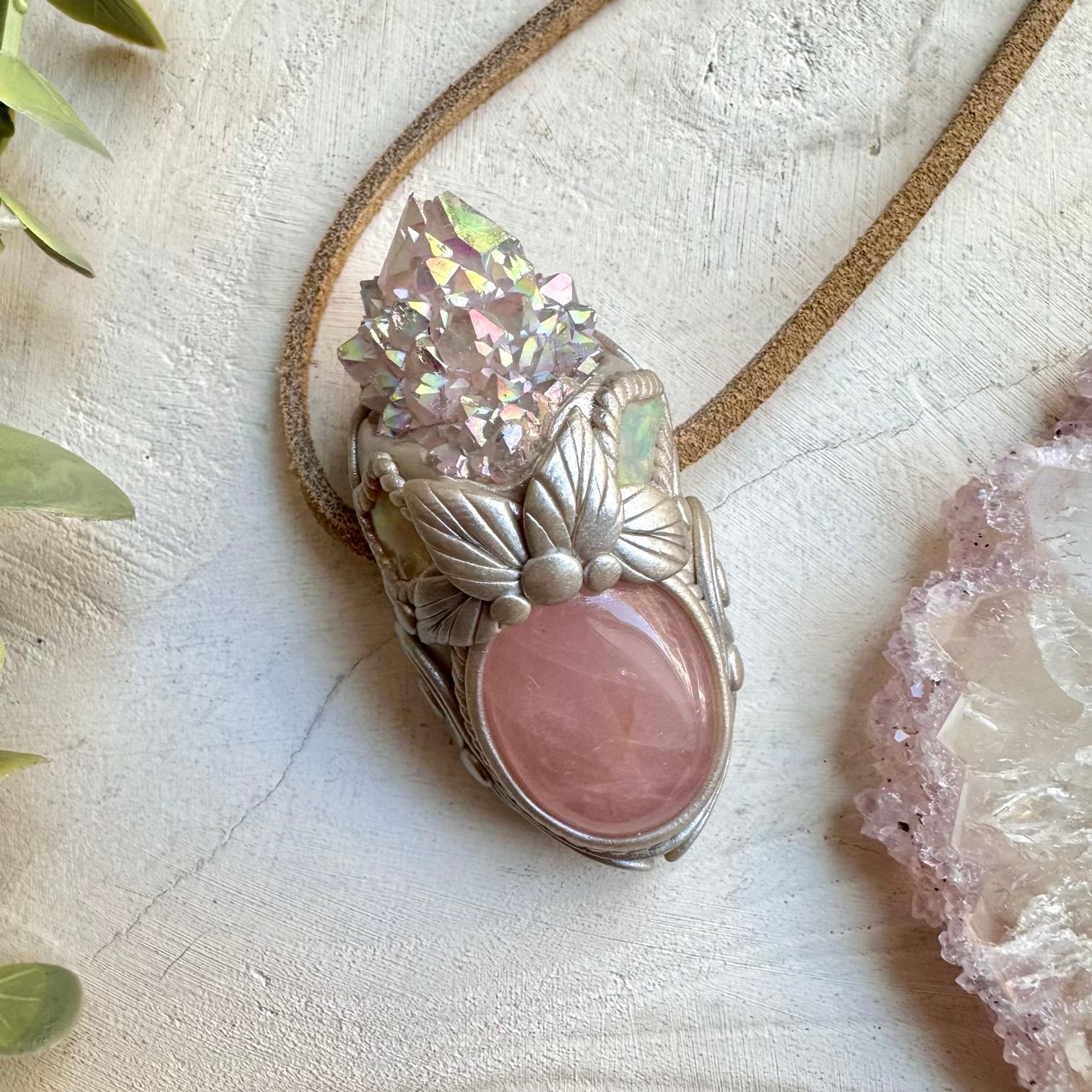Spiritual pendant featuring angel aura spirit quartz and rose quartz