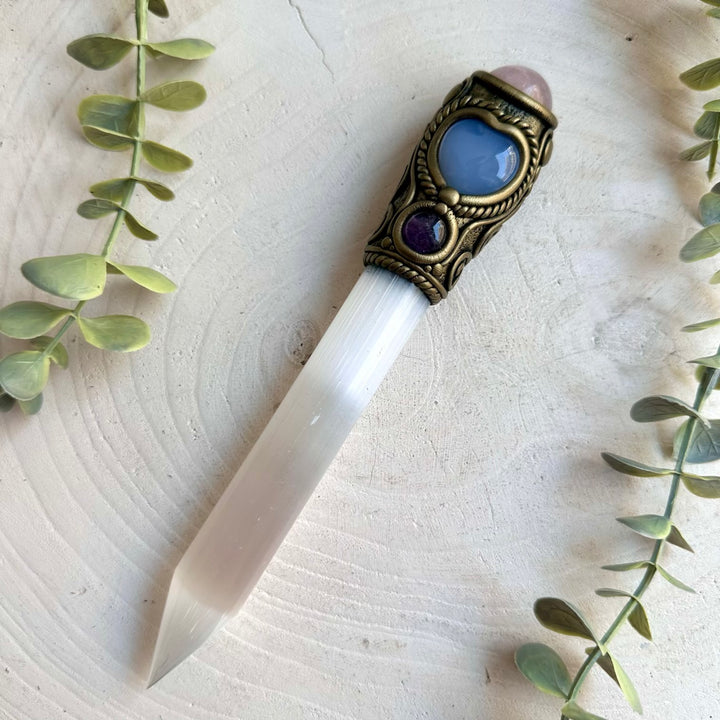 Handmade Selenite crystal wand featuring Rose Quartz, a Blue Chalcedony Heart and Amethyst. A one of a kind healing energy tool combining soft pink, calming blue and deep purple crystals with luminous Selenite, created for meditation, energy work, intention setting and spiritual practice.