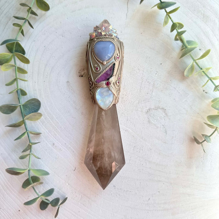 Healing crystal wand with smoky quartz and natural gemstones for meditation rituals and manifestation